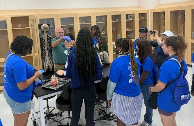 Battle Creek Central High students touring health simulation lab